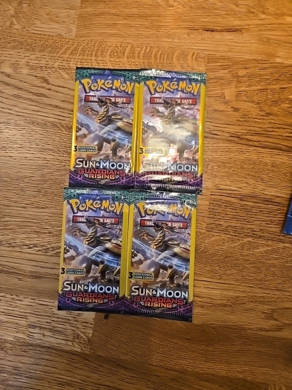 Sun & Moon Guardians Rising Booster Packs - Brand - Yellow Accent